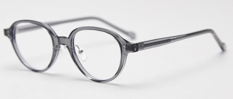 Lumo 06 – Montura ovalada minimalista en TR90 y acetato. Versatilidad sin esfuerzo. Diseño limpio y funcional, perfecta para quienes valoran lo simple y duradero. Su estructura combina ace
