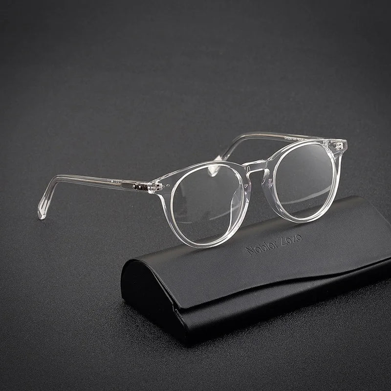 Lumo 07 – Montura redonda artesanal en acetato

Diseño con alma, hecho para durar.
Esta montura de forma redonda y acabado artesanal está fabricada en acetato de alta calidad. Su diseño vintage, elegante y estructurado l