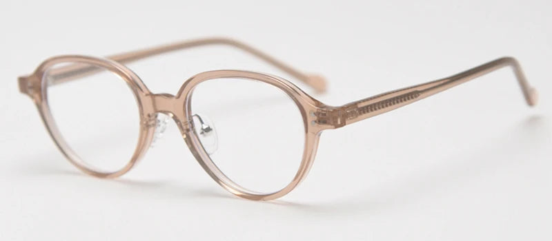 Lumo 06 – Montura ovalada minimalista en TR90 y acetato. Versatilidad sin esfuerzo. Diseño limpio y funcional, perfecta para quienes valoran lo simple y duradero. Su estructura combina ace